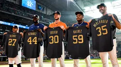 MLB All-Star selections of the Houston Astros stand with their jerseys.