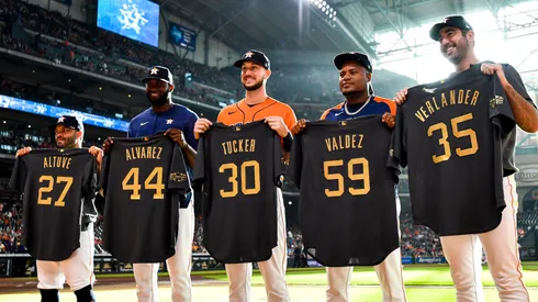 MLB All-Star selections of the Houston Astros stand with their jerseys.