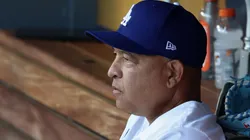 Manager Dave Roberts #30 of the Los Angeles Dodgers looks on.