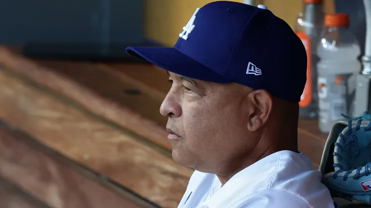 Manager Dave Roberts #30 of the Los Angeles Dodgers looks on.