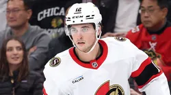 Shane Pinto #12 of the Ottawa Senators skates against the Chicago Blackhawks.