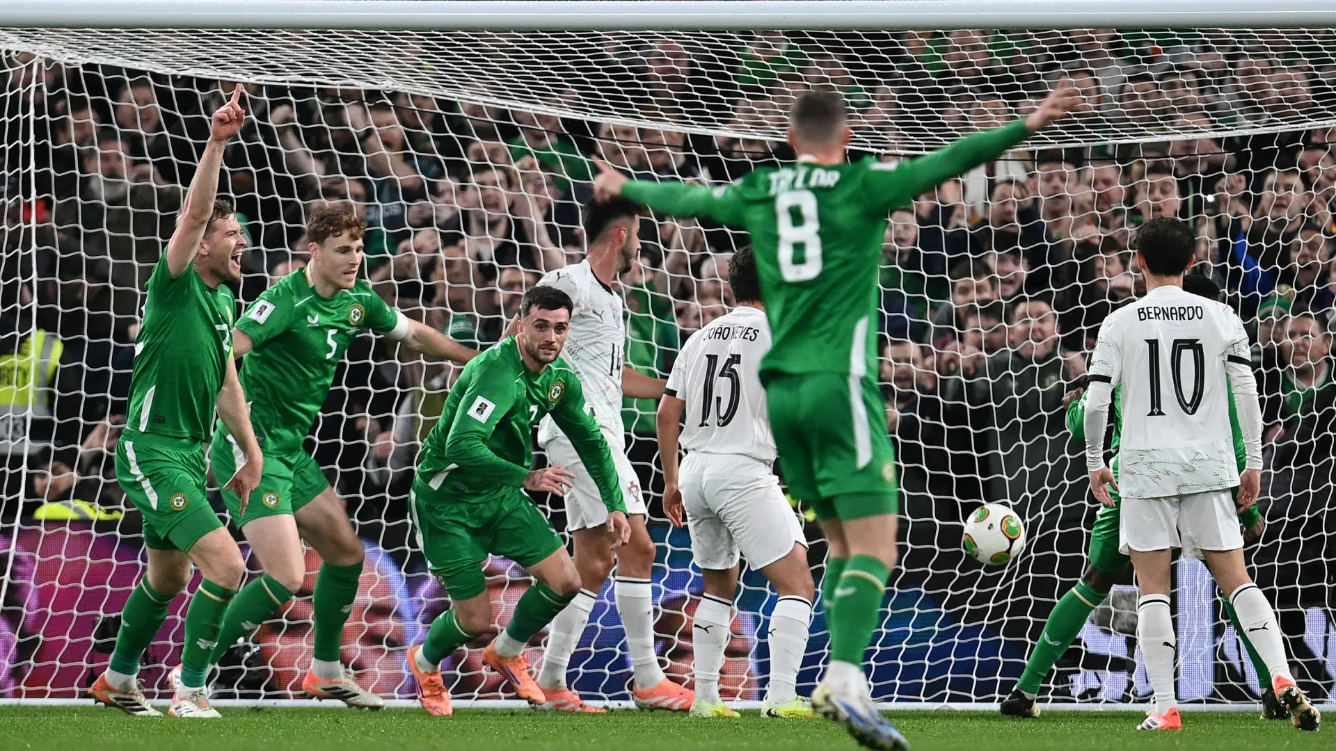 Troy Parrott scores against Portugal. (Getty Images)