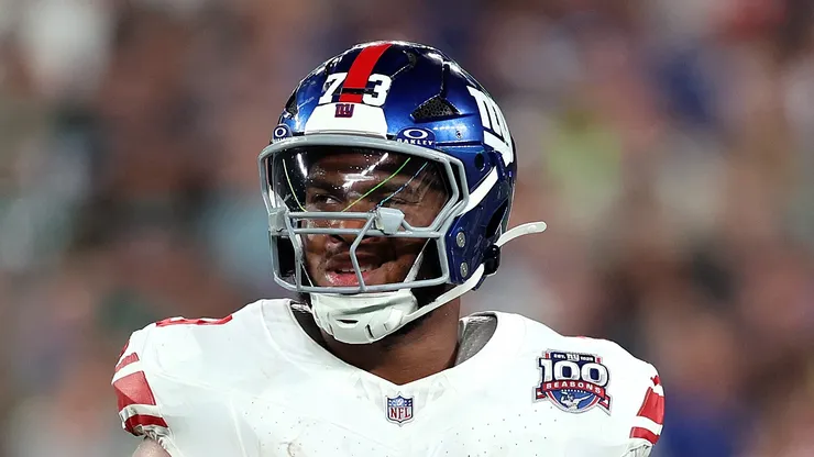 Evan Neal looks on against the Jets on August 24, 2024 in East Rutherford.