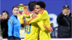 James Rodriguez of Colombia celebrates after scoring the team's first goal with Luis Diaz.