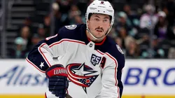 Zach Werenski #8 of the Blue Jackets skates against the Kraken.