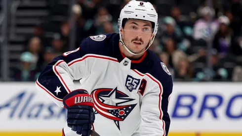 Zach Werenski #8 of the Blue Jackets skates against the Kraken.