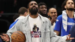 Kyrie Irving #11 of the Dallas Mavericks looks to the scoreboard.