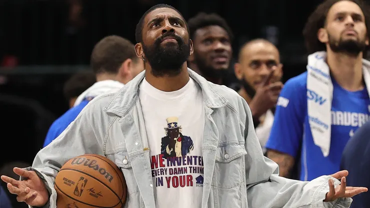 Kyrie Irving #11 of the Dallas Mavericks looks to the scoreboard.