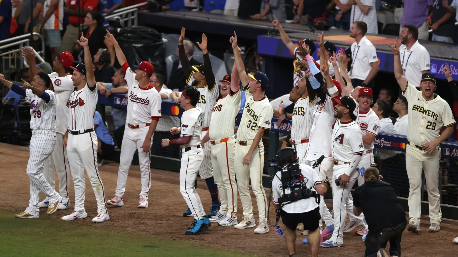 The National League team reacts during the Swing Off at the end of the All-Star Game. Katharine Lotze/Getty Images