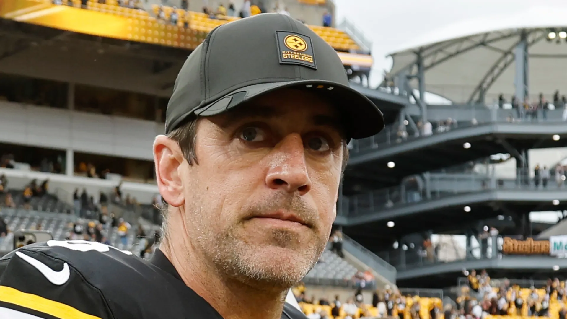 Aaron Rodgers after a game in the 2025 NFL season