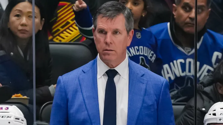New York Rangers head coach Mike Sullivan looks on during an NHL game.