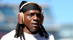 Jaycee Horn warms up against the Patriots on September 28, 2025 in Foxborough.