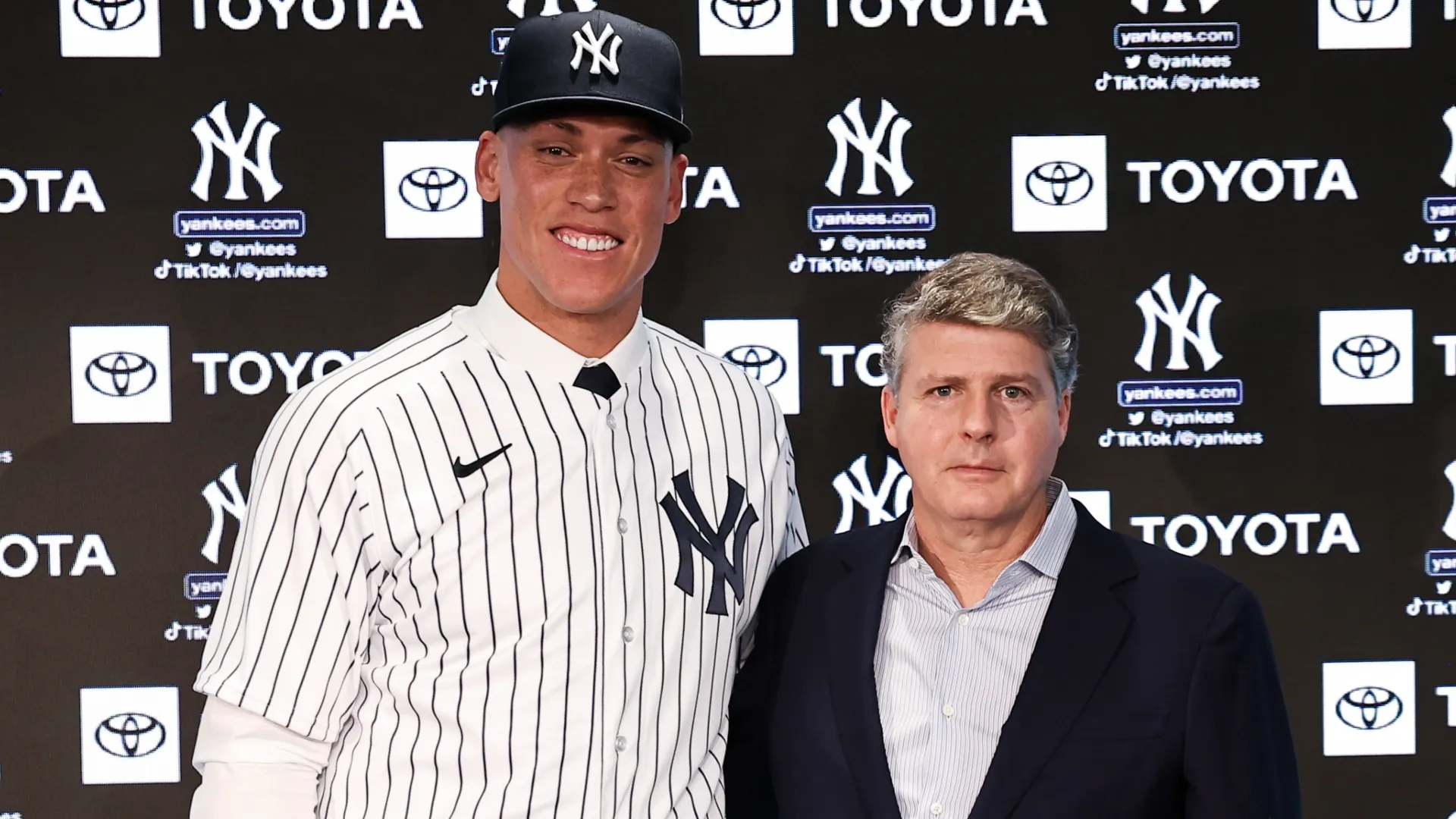 Aaron Judge #99 of the New York Yankees poses for a photo with Yankees principal owner Hal Steinbrenner. Dustin Satloff/Getty Images