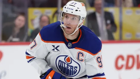 Connor McDavid #97 of the Edmonton Oilers skates with the puck.