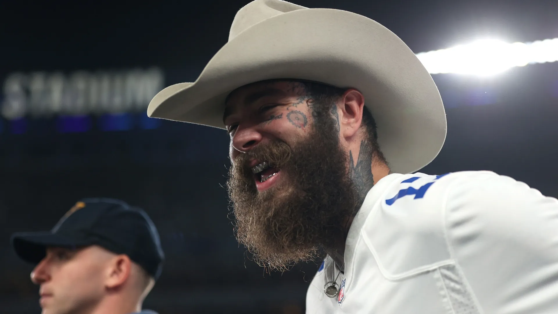 Post Malone looks on prior to a game between the New York Giants and the Dallas Cowboys in 2024. (Source: Sarah Stier/Getty Images)