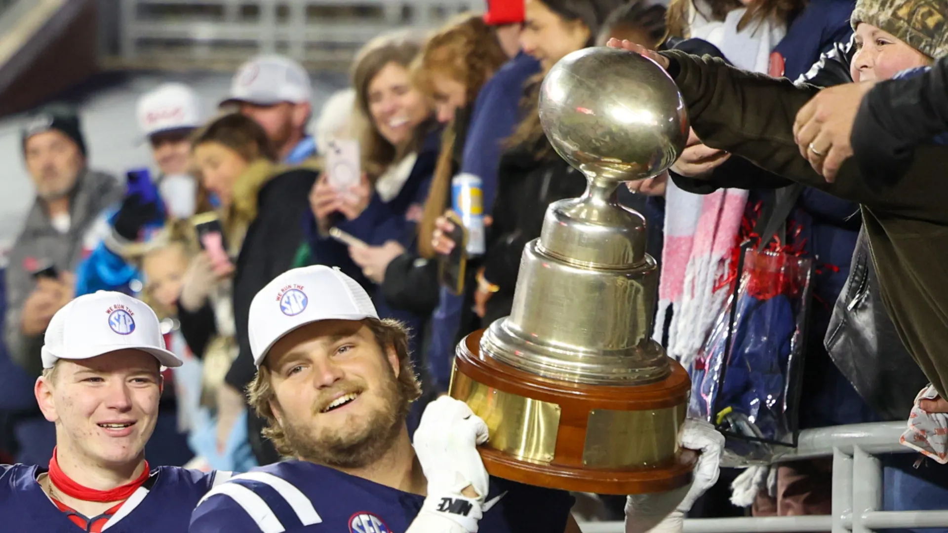Ole Miss celebrates with the Golden Egg