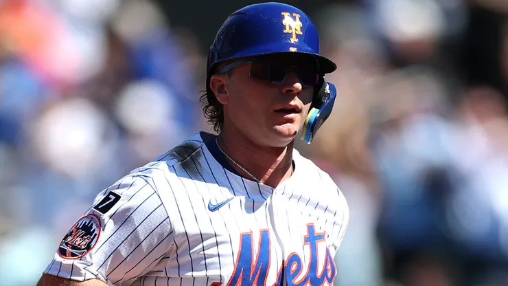 Pete Alonso #20 of the New York Mets reacts to a home run during the game.