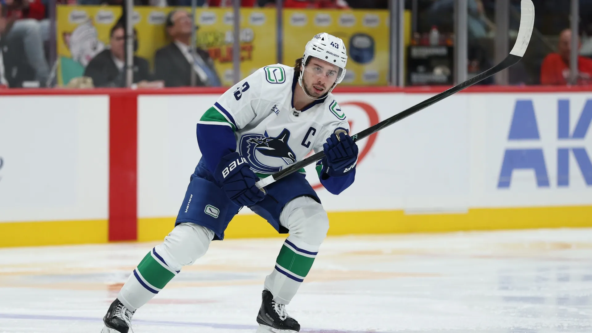 .Quinn Hughes #43 of the Canucks skates against the Washington Capitals Patrick Smith/Getty Images