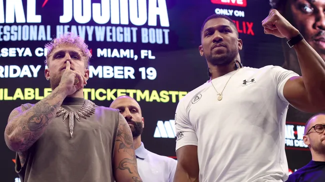 Jake Paul and Anthony Joshua face off during the press conference. Leonardo Fernandez/Getty Images