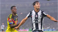 Oliver Torres of Monterrey fights for the ball with Cristian Borja of América