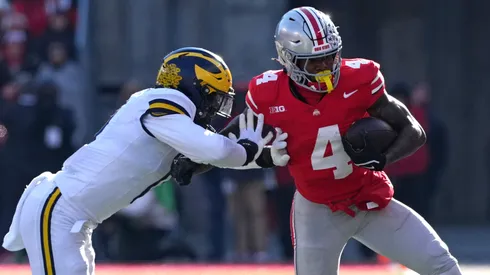 Jeremiah Smith of the Ohio State Buckeyes and Josaiah Stewart of the Michigan Wolverines.