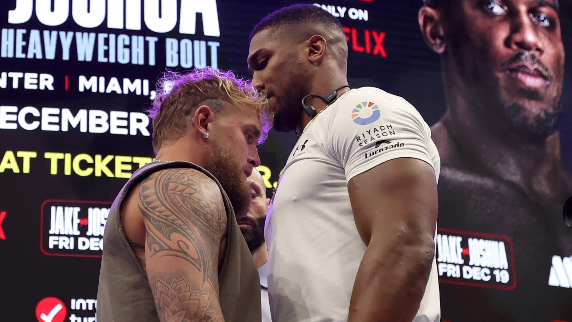 Jake Paul and Anthony Joshua face off during the press conference about their exhibition match. Leonardo Fernandez/Getty Images