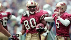 Jerry Rice #80 of the San Francisco 49ers get congradulated on his touchdown in 2000.