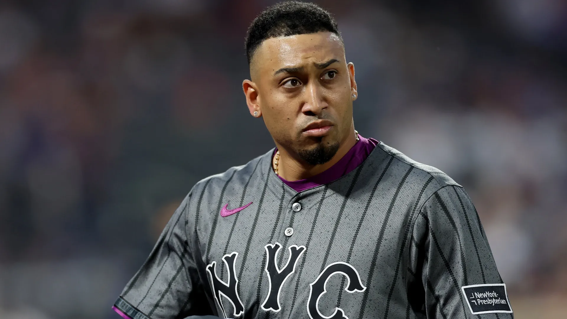 Edwin Díaz #39 of the New York Mets walks to the dugout. Elsa/Getty Images)}