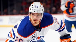 Jack Roslovic #28 of the Oilers skates against the Devils.