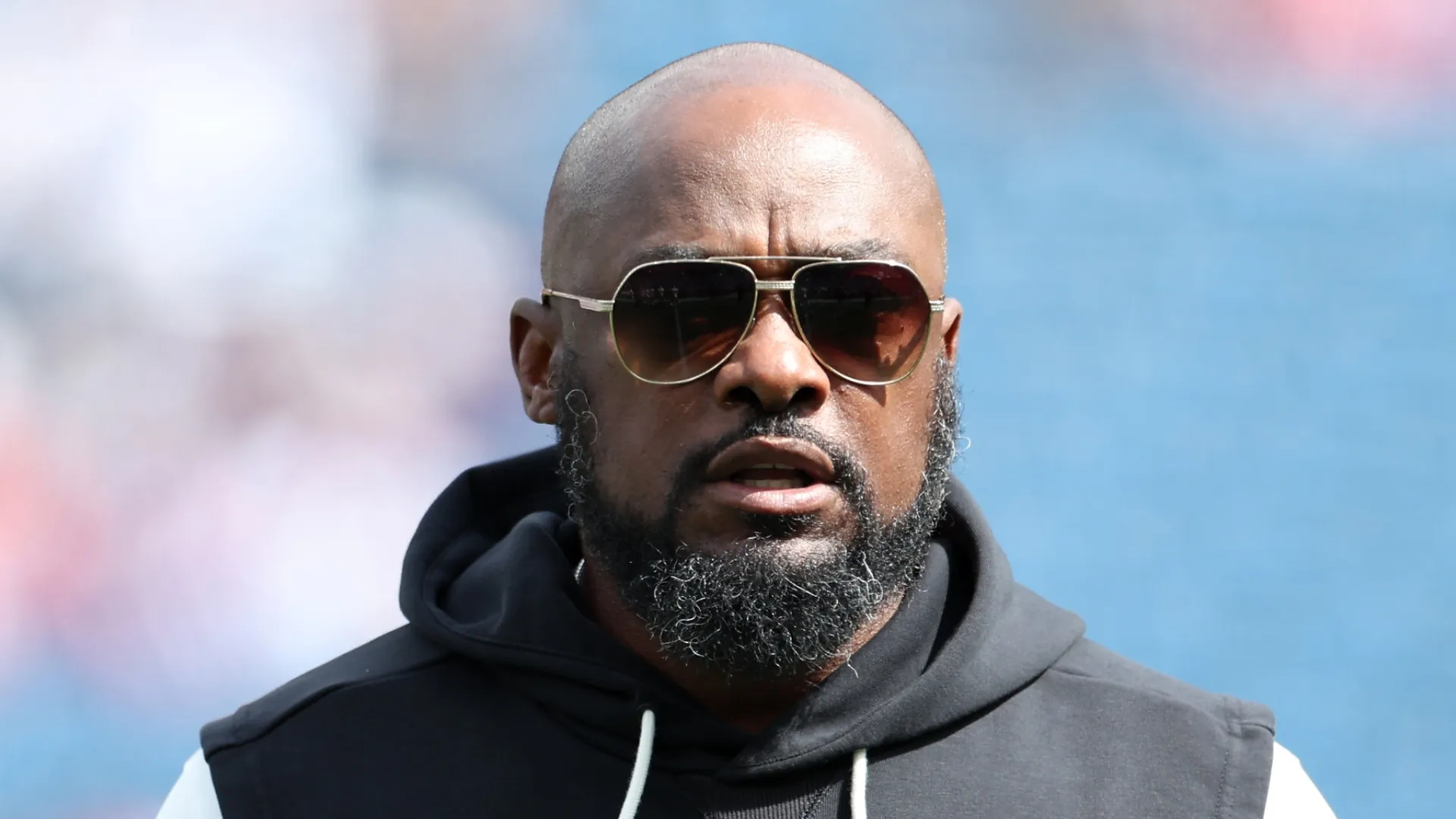 Mike Tomlin watching during a game