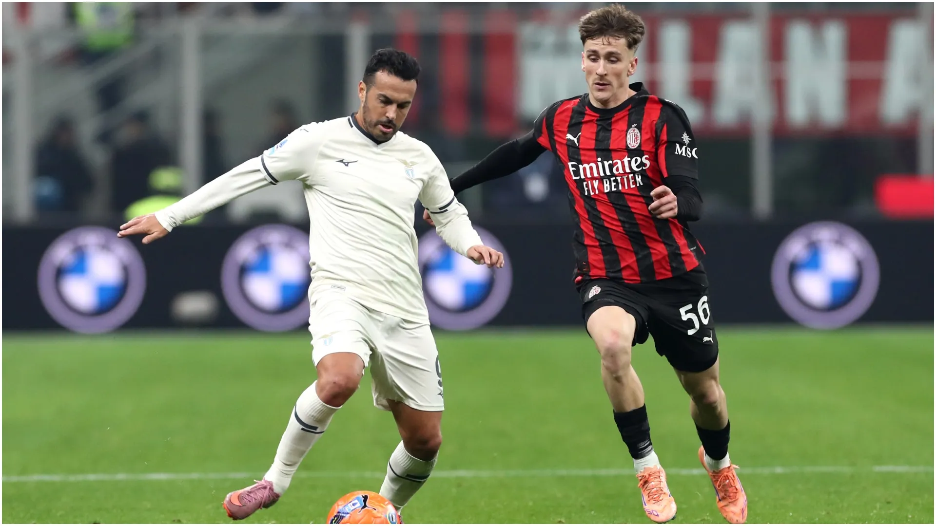 Pedro Rodriguez of Lazio is challenged by Alexis Saelemaekers of AC Milan – Marco Luzzani/Getty Images