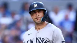 Giancarlo Stanton #27 of the New York Yankees reacts.