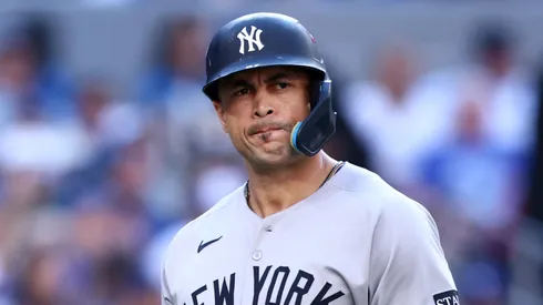 Giancarlo Stanton #27 of the New York Yankees reacts.