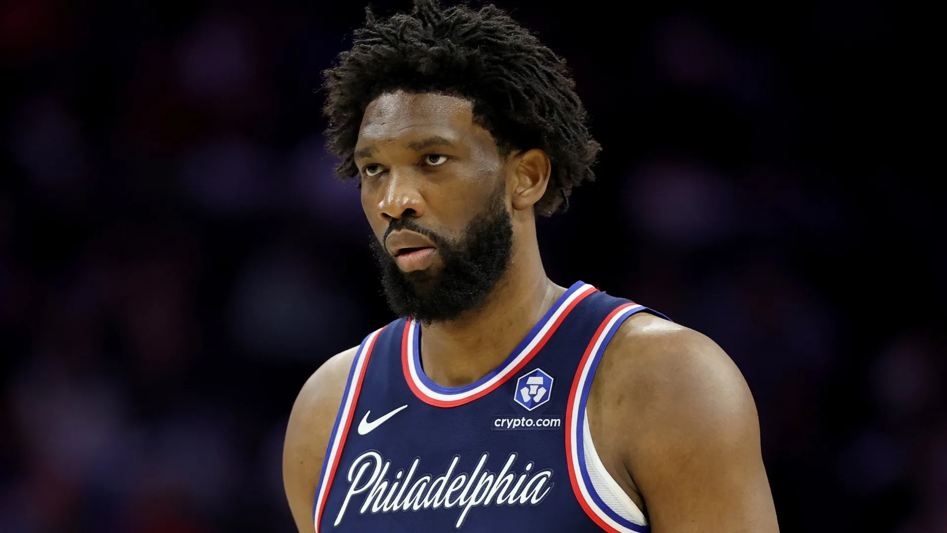 Joel Embiid looks on