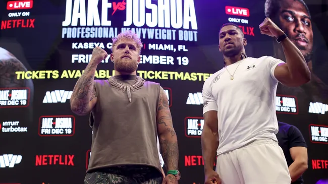Jake Paul and Anthony Joshua face off during the press conference. Leonardo Fernandez/Getty Images