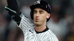 Cody Bellinger #35 of the New York Yankees celebrates after hitting a double.