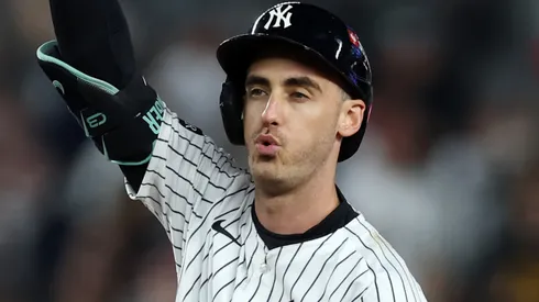 Cody Bellinger #35 of the New York Yankees celebrates after hitting a double.