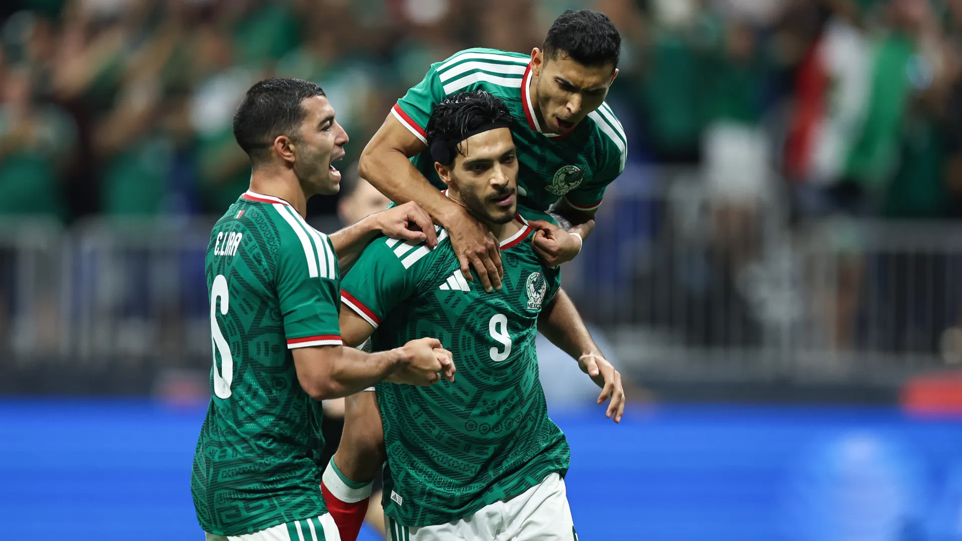 Raul Jimenez celebrates a goal with his teammates. (Getty Images)