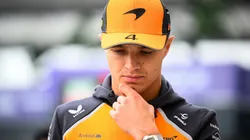 Lando Norris of Great Britain and McLaren looks on.