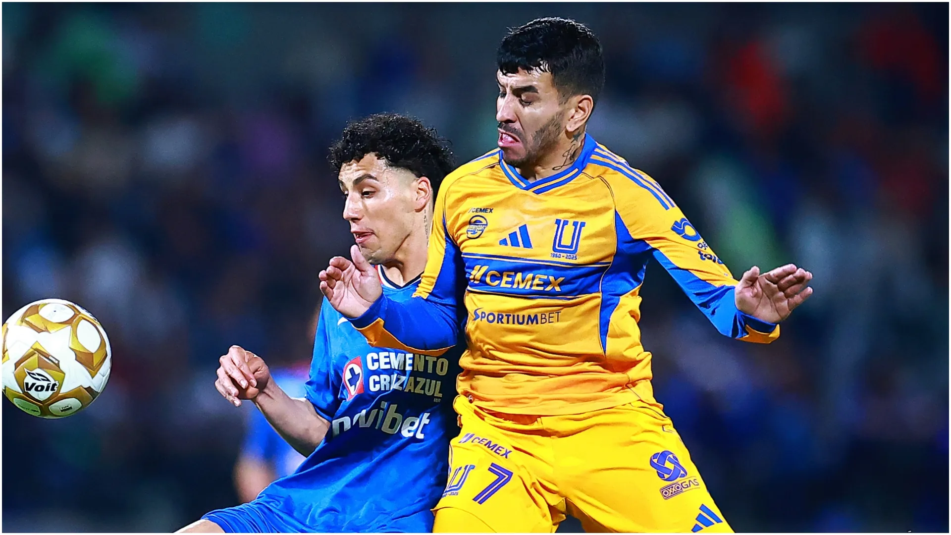 Angel Correa of Tigres is put under pressure by Jorge Sanchez of Cruz Azul – Manuel Velasquez/Getty Images