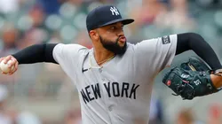 Devin Williams #38 pitches during an MLB game.