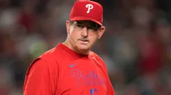 Rob Thomson #49 of the Phillies walks to the mound.