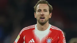 Harry Kane of Bayern Munich carries the match ball.