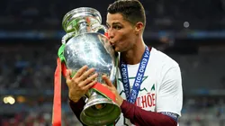 Cristiano Ronaldo of Portugal kisses the Henri Delaunay trophy.