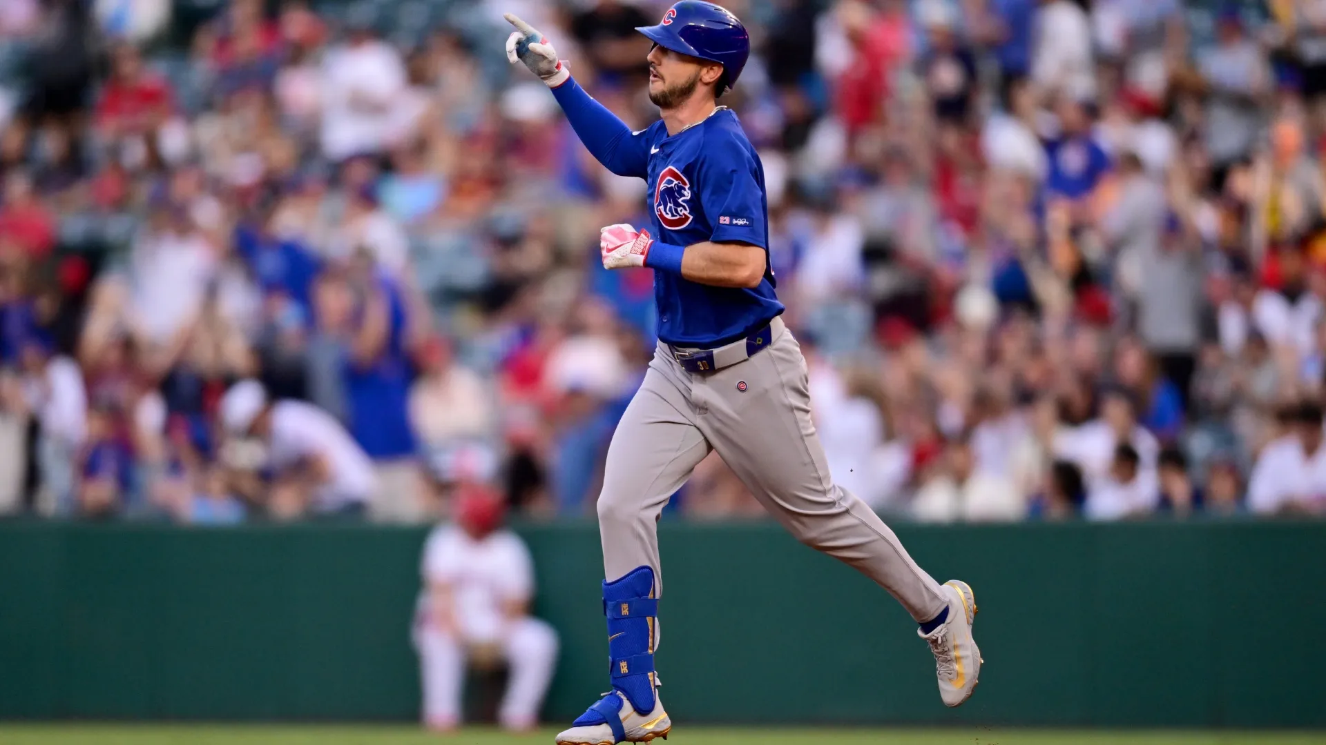 Kyle Tucker #30 with the Cubs rounds the bases after hitting a home run. John McCoy/Getty Images