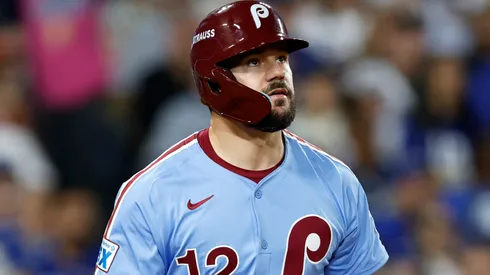 Kyle Schwarber #12 of the Philadelphia Phillies reacts after hitting a solo home run.