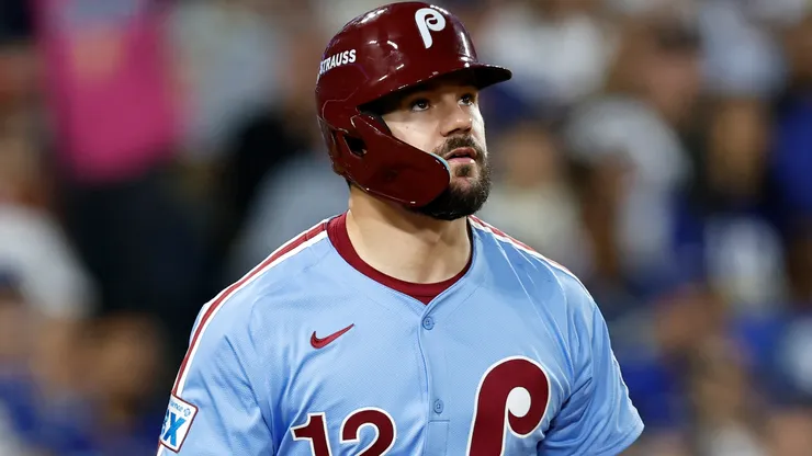 Kyle Schwarber #12 of the Philadelphia Phillies reacts after hitting a solo home run.