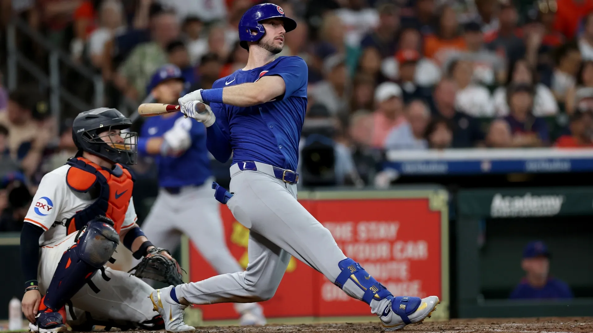 Kyle Tucker #30 with the Cubs hits a home run. Photo by Tim Warner/Getty Images
