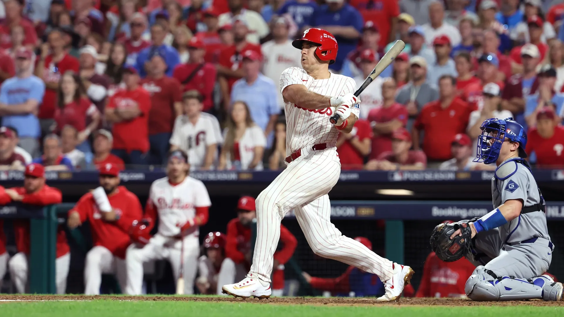 J.T. Realmuto #10 of the Philadelphia Phillies hits a double. Hunter Martin/Getty Images