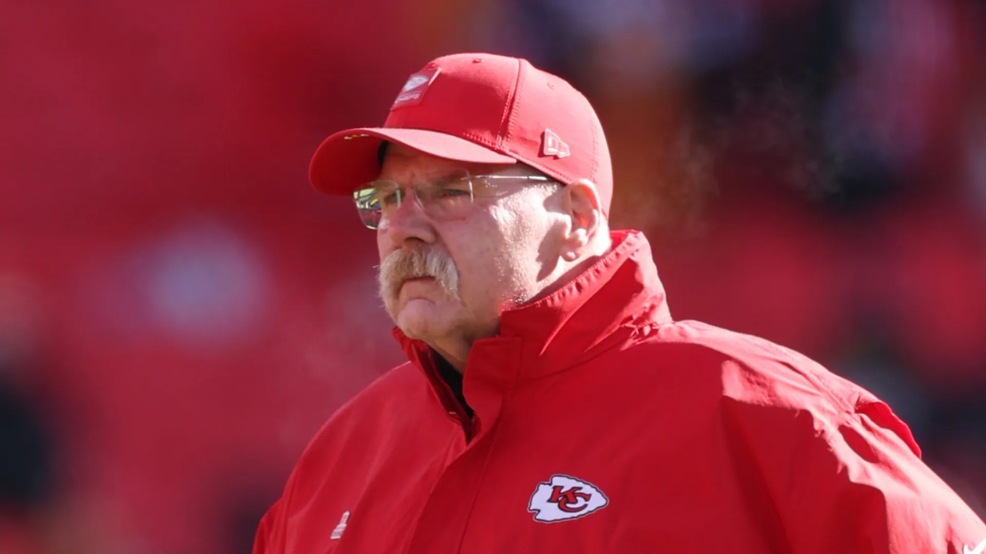 Andy Reid looks on before a game